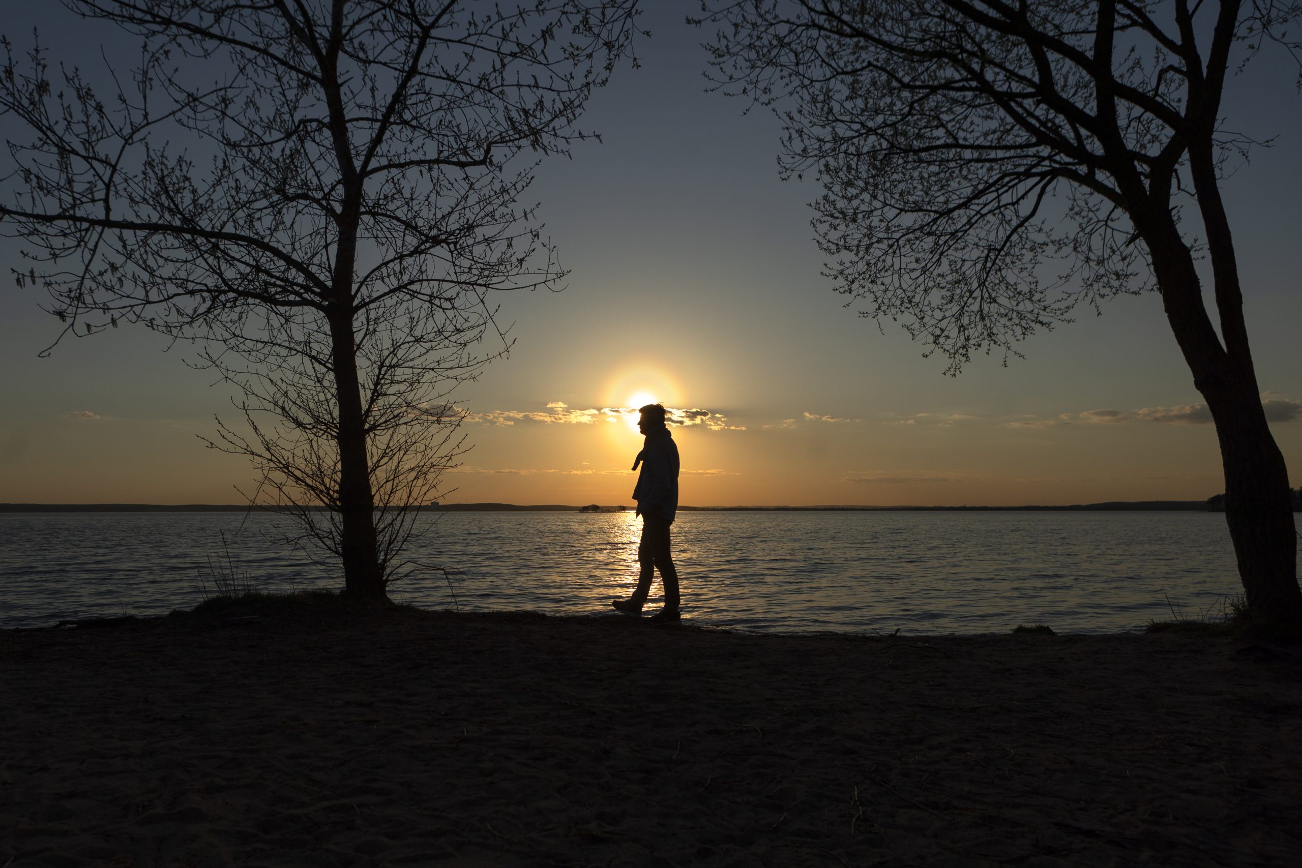 sad-contemplative-person-near-lake